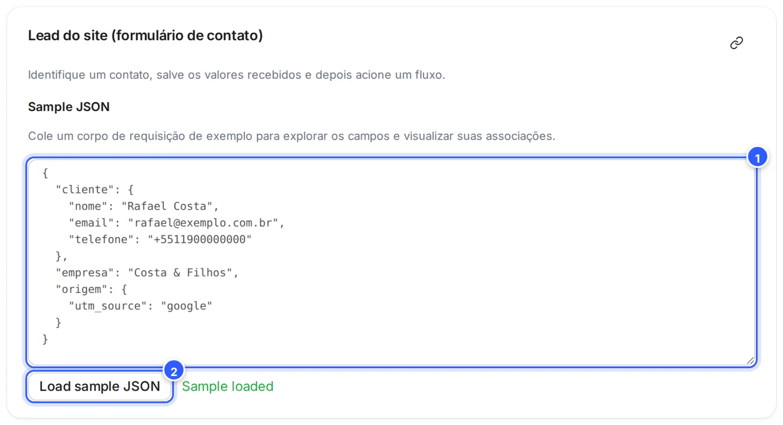 Quadro Sample JSON com um JSON de exemplo de um lead (nome, e-mail, telefone, empresa e origem), o botão Load sample JSON e o aviso Sample loaded.